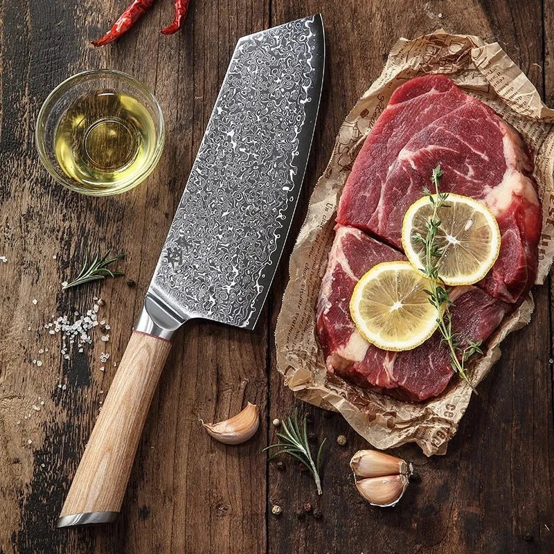 Damascus pattern kitchen knife set with V gold steel core showing 67-layer folded construction