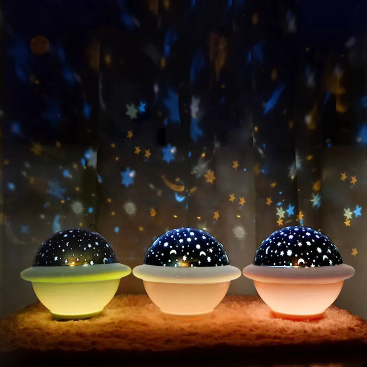 UFO-shaped starry sky projection night light in green, pink or white with 15.1cm cube dimensions
