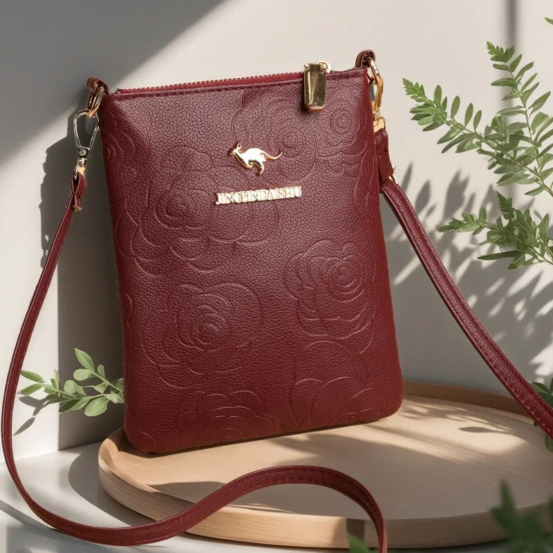 Square vertical shoulder messenger bag in stone pattern colour with file compartment visible