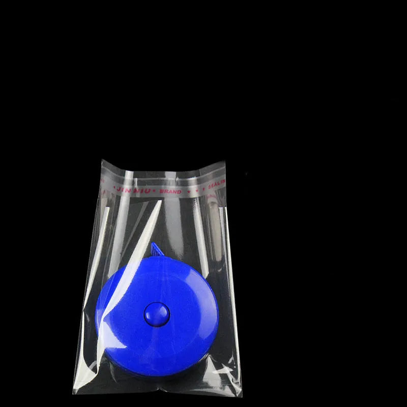 Transparent self-adhesive OPP bags, 7x10cm, with peel-and-seal closure, on a white background.
