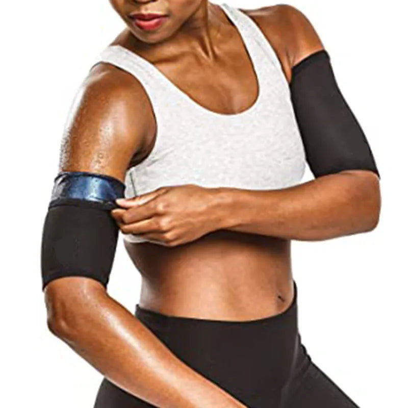Adjustable arm sweatband in blue on a gym background, showing the binding strap.