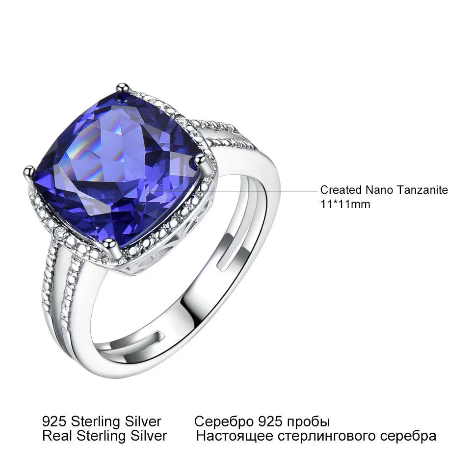 Women's sterling silver ring with a deep blue tanzanite gemstone.