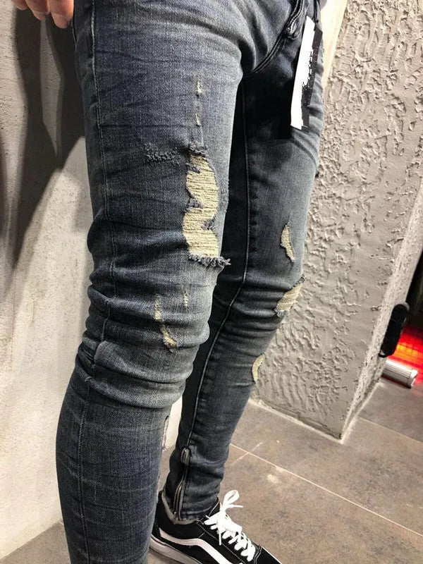 Men's gray blue stretch biker jeans with hole details, slim fit, on a model
