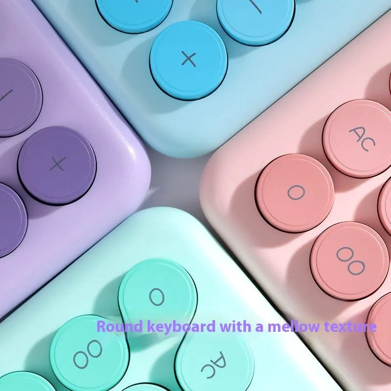 Gradient colour desk calculator in violet, cherry blossom pink, glacier blue, or mint green.