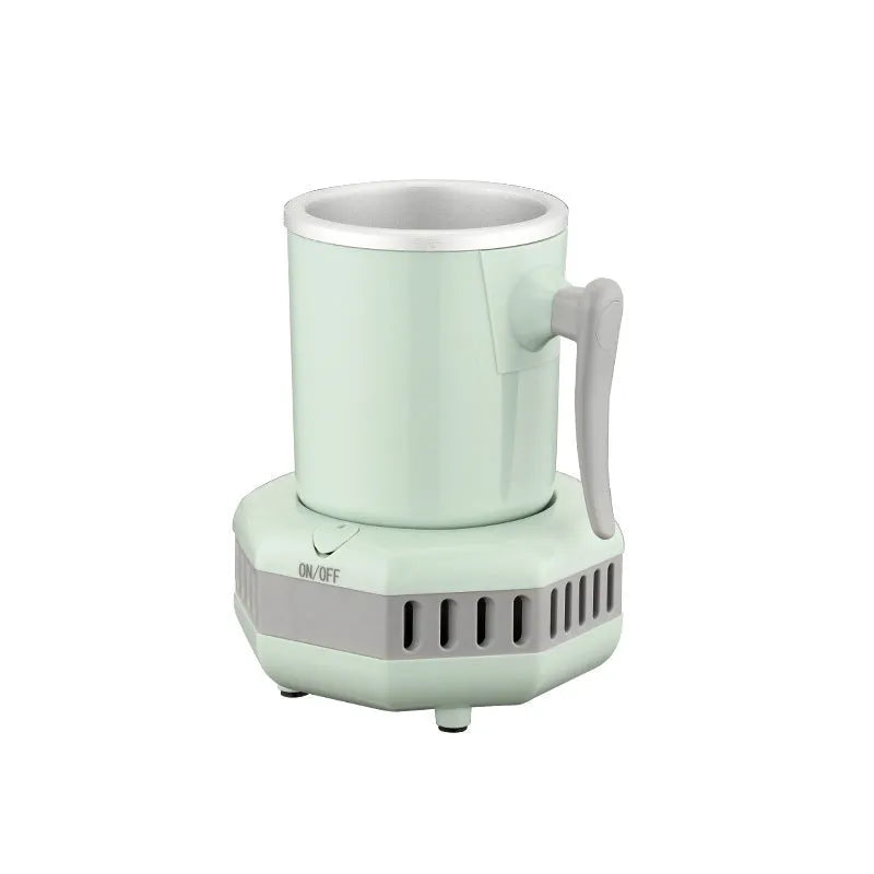 White quick-cooling aluminium cup on its electronic base station with power adapter