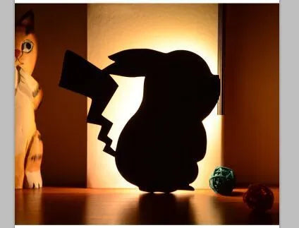 LED cat-shaped night light with sound sensor, warm yellow glow, acrylic shade, wall-mounted in a bedroom