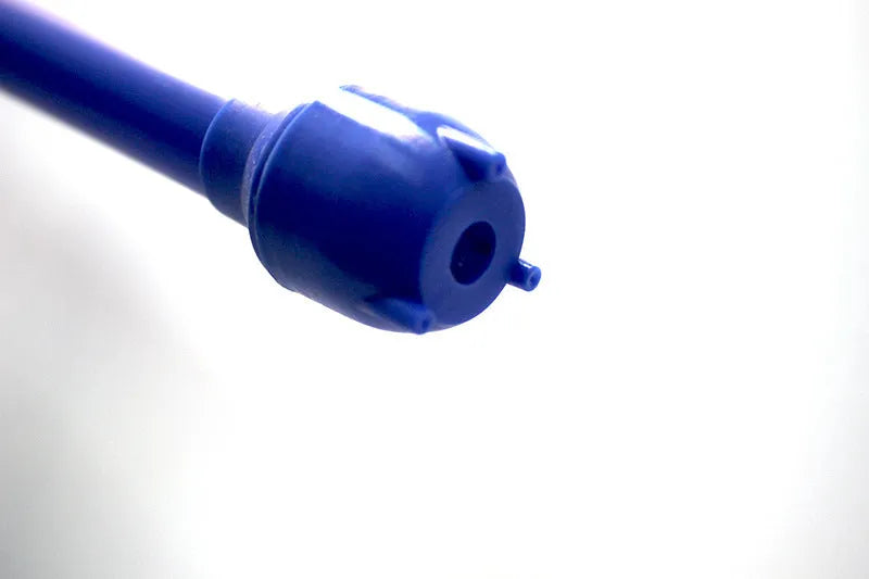 Blue and red manual hand siphon pump for transferring fuel, oil, and chemicals.