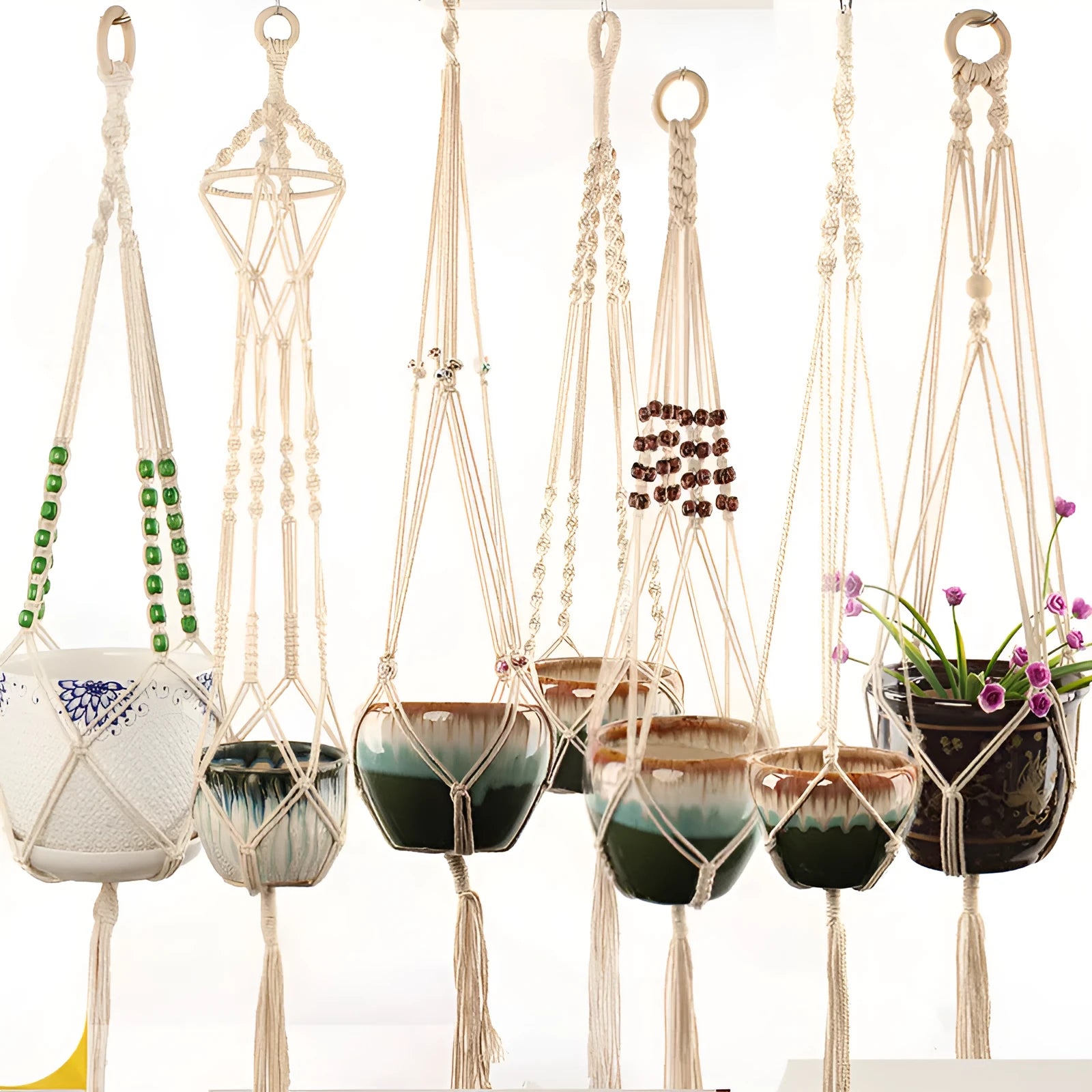 Woven cotton rope and wire basket planter in a rustic style for wall or desktop plant display.