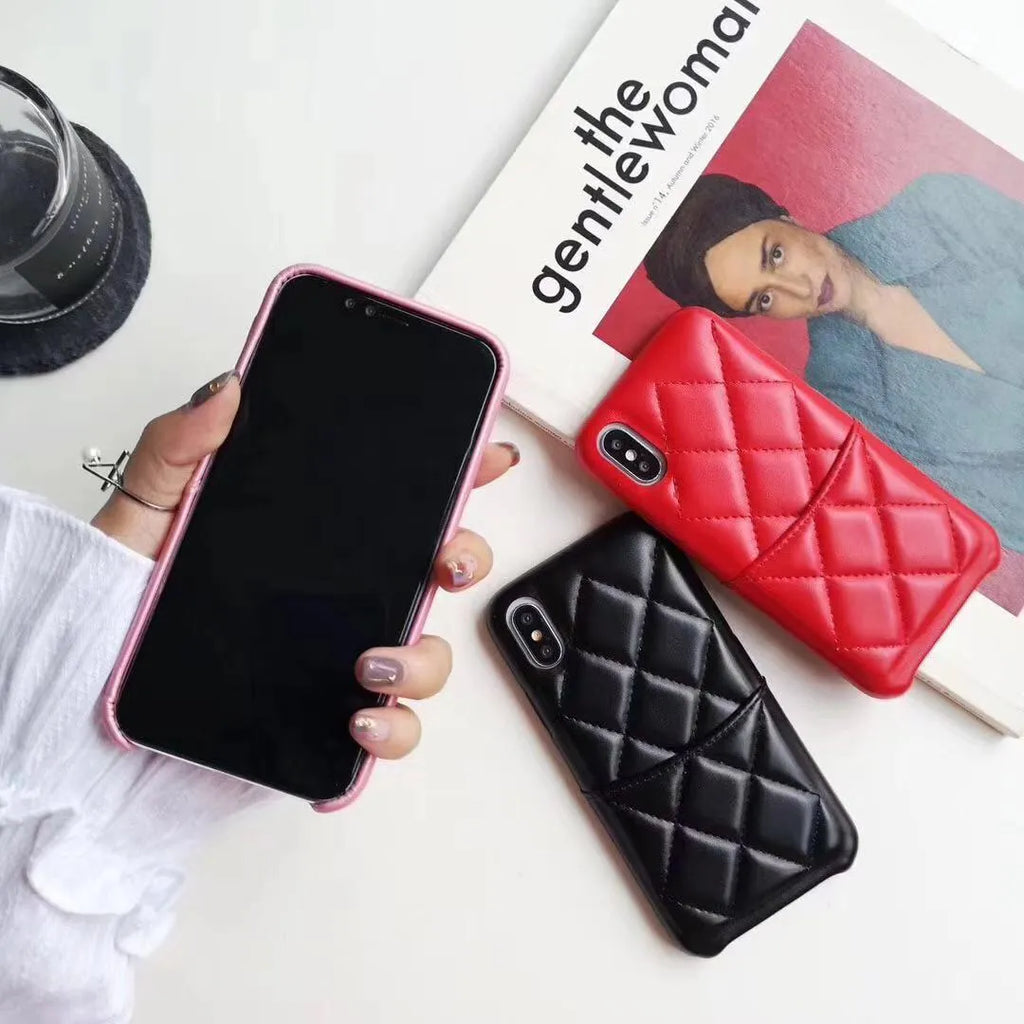 Black leather phone case for iPhone XS Max on a table