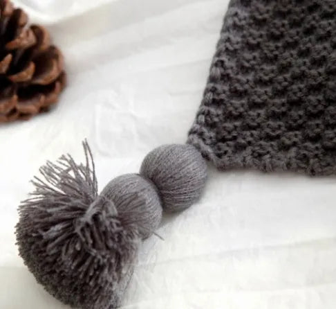 Nordic style fringed knit ball blanket in acrylic fabric, size 130x170cm, shown in beige colour
