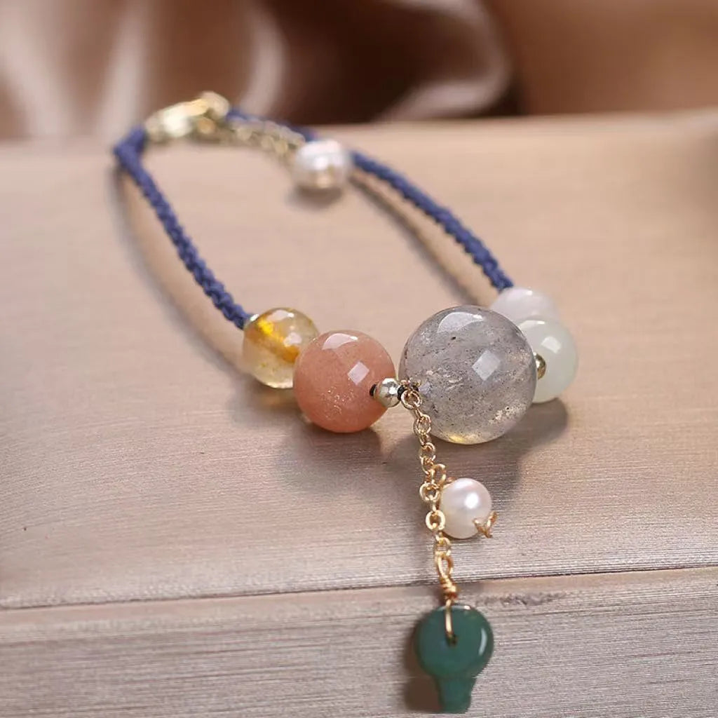 Hand-woven crystal sequin peace buckle bracelet for women in red, green, and blue colour options