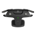 Compact black F5 Bluetooth game controller for mobile phones next to a smartphone.