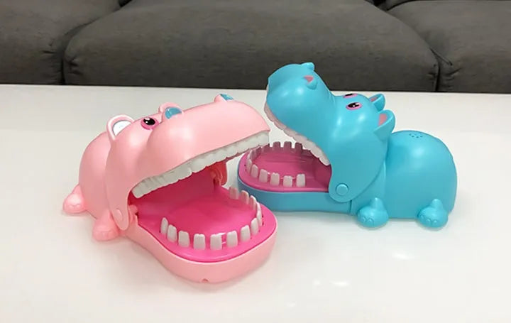 Multicoloured plastic bite hand animal toy in dog, crocodile, shark, and hippo shapes for parent-child game play