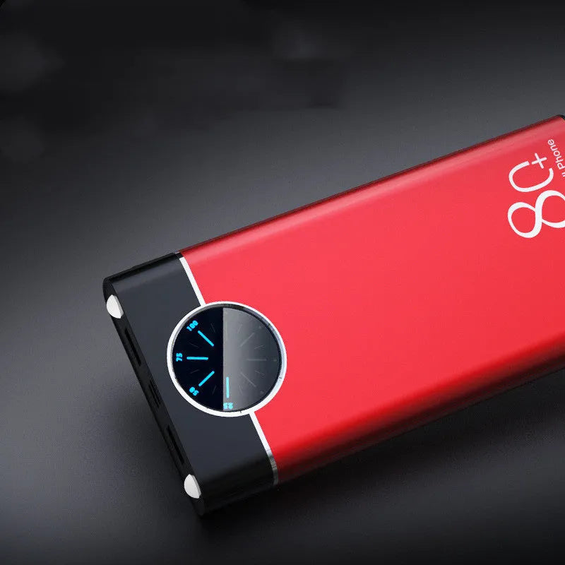 Black alloy fast charging power bank showing front with USB ports and LED flashlight.