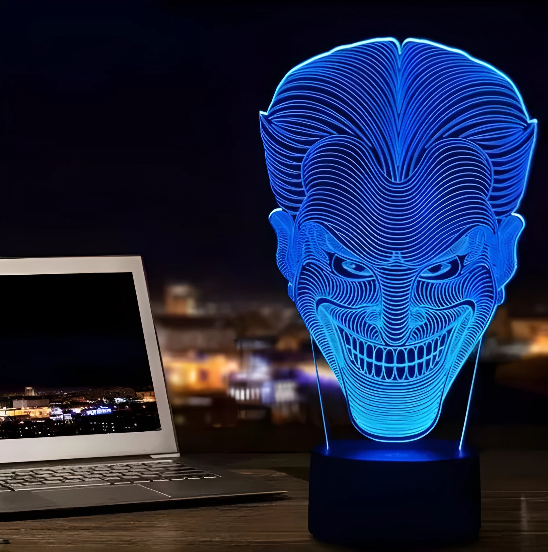 USB-powered 3D LED desk lamp showing multiple colour modes on an acrylic panel with a remote control.