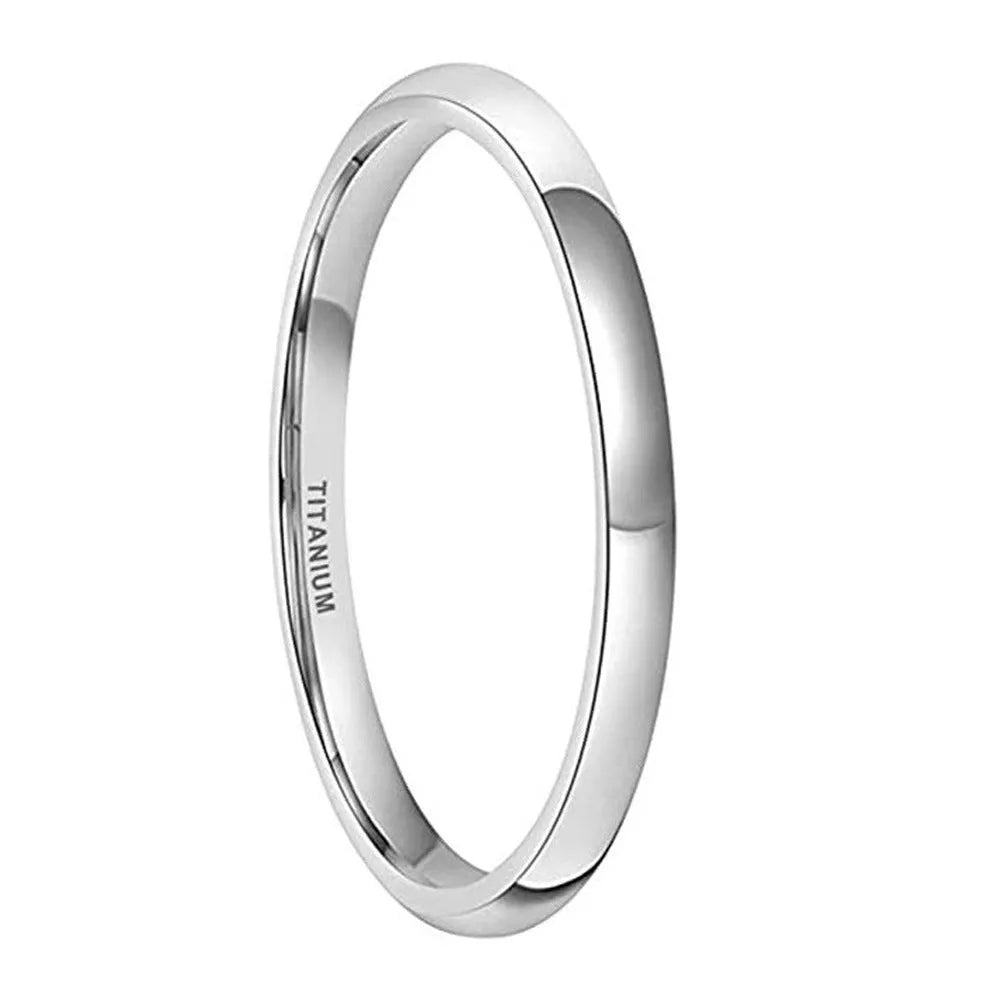 Polished silver titanium ring showing different width options on a finger.