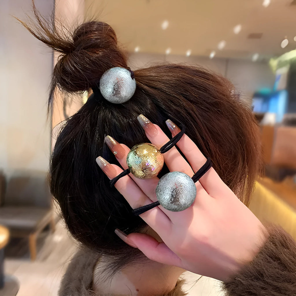 Resin hair band headdress with electroplated gold finish, round head rope style on a white background