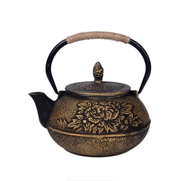 Japanese style cast iron teapot with decorative patterns in 0.9 litre capacity