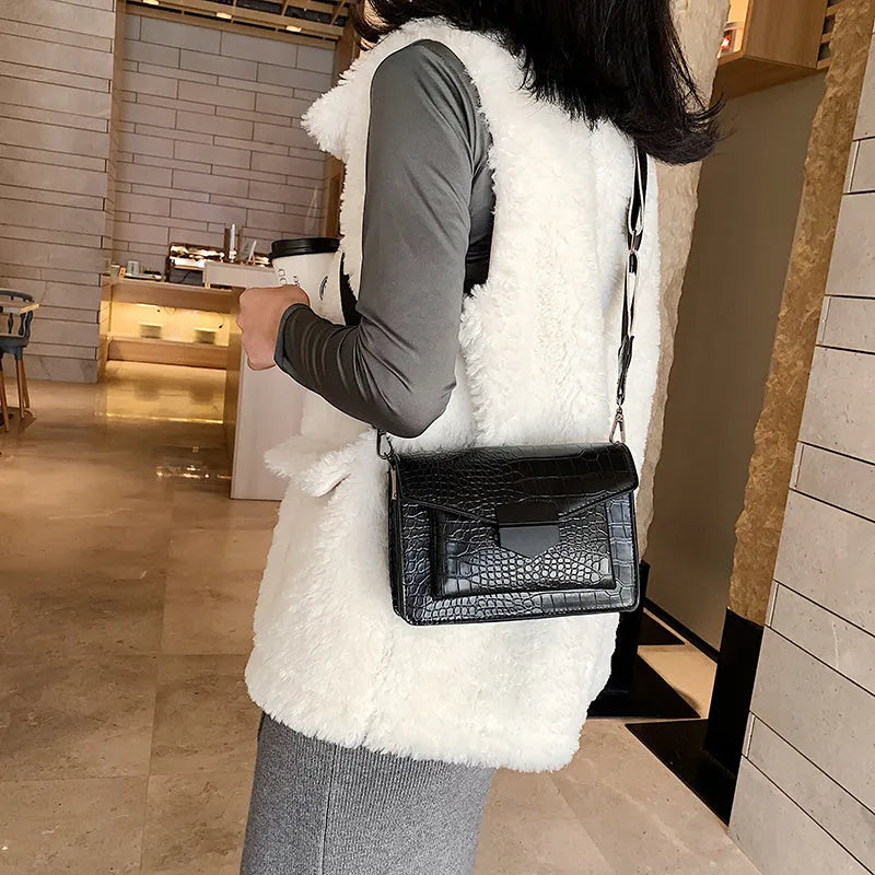 PU crossbody bag in four colours showing 20cm width and 14cm height
