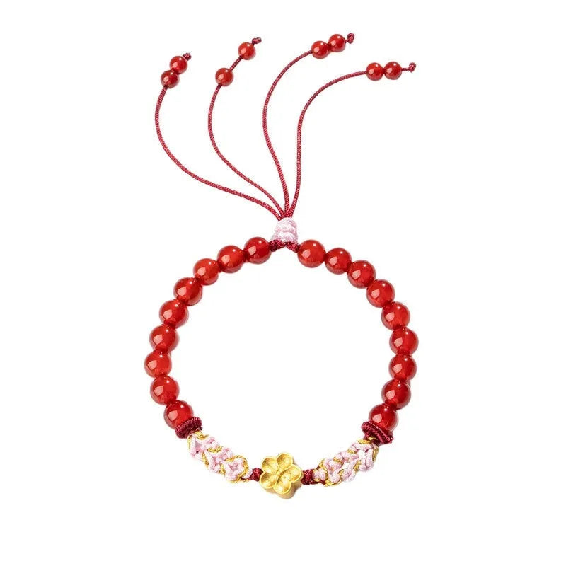 Hand-woven red rope bracelet with diamond shaped crystal and peach blossom Chinese design