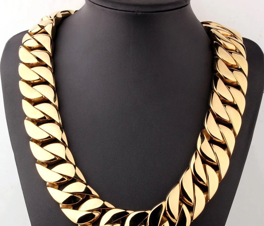 Men's gold titanium steel vacuum plating casting necklace with geometric design and whip chain on a white background