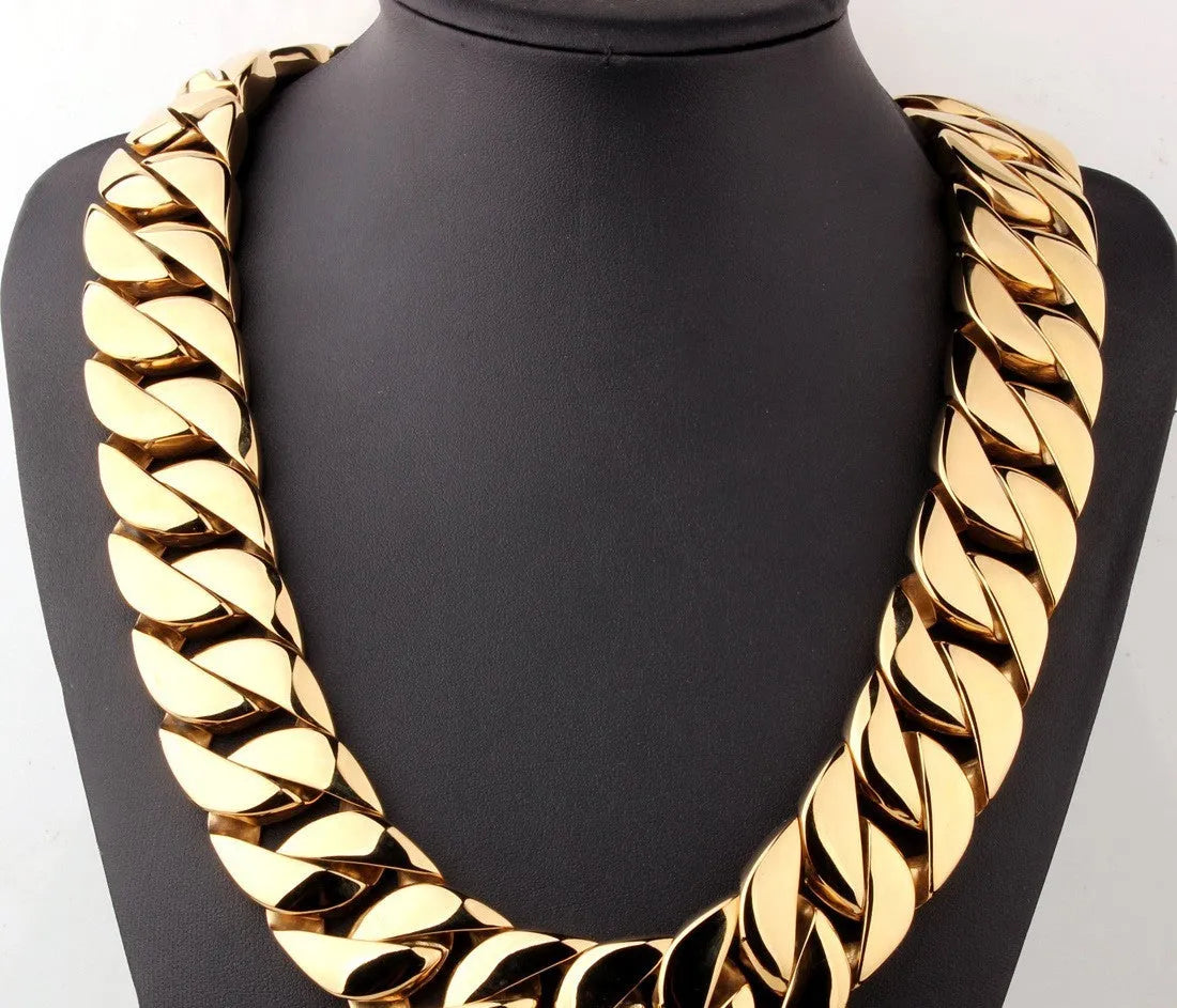 Men's gold titanium steel vacuum plating casting necklace with geometric design and whip chain on a white background