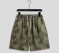Men's casual geometric printed quick-drying polyester shorts in loose fit, mid waist, drawstring closure