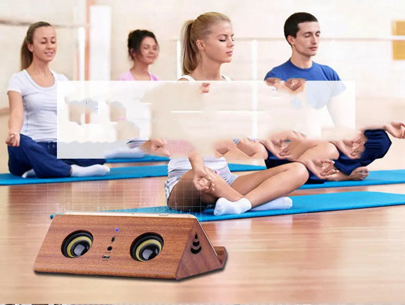 Bronze wooden home speaker with wooden shell, 3.5mm connection, and control panel on top