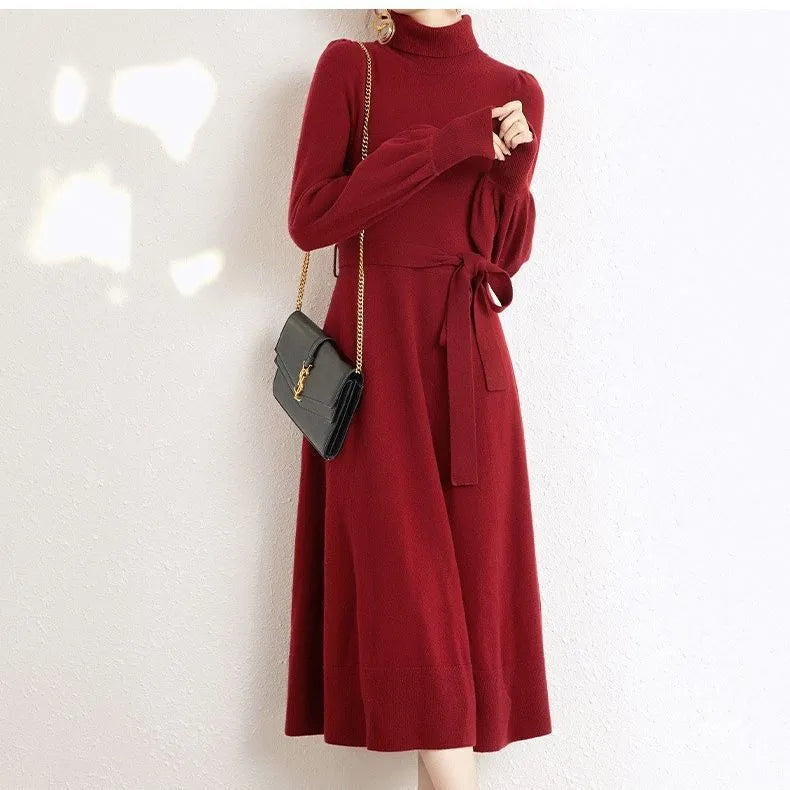 Rose red turtleneck knit dress with long sleeves, elastic waist, and a loose mid-length hem.