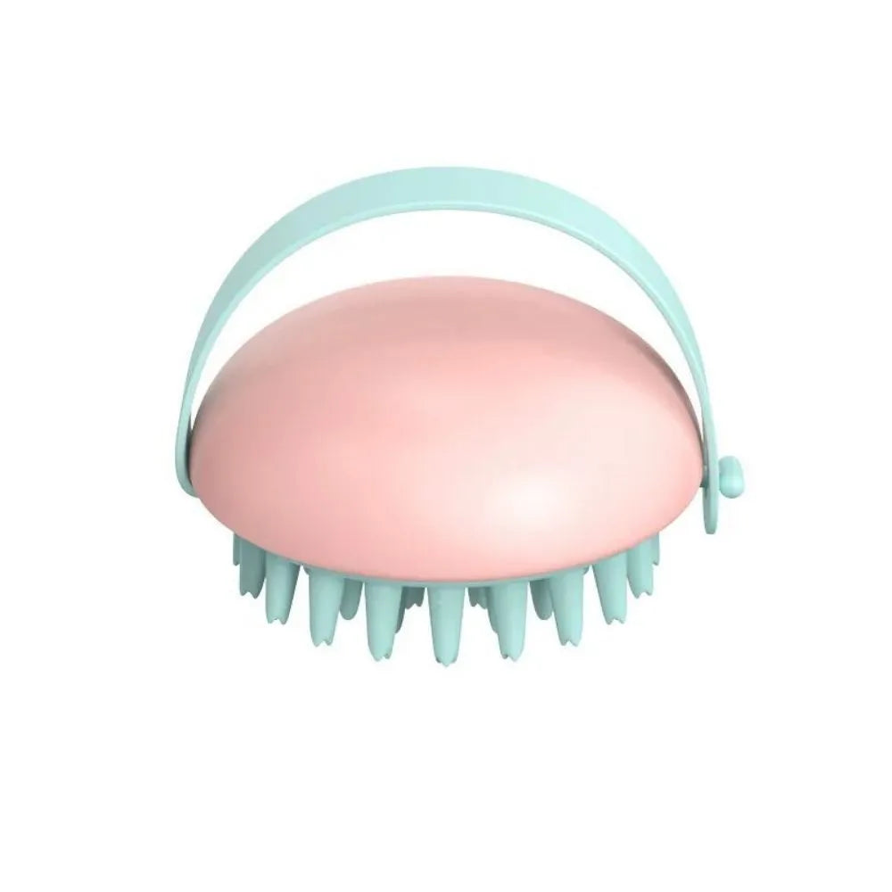 Blue silicone pet bathing and grooming brush with soft bristles and an ergonomic handle.