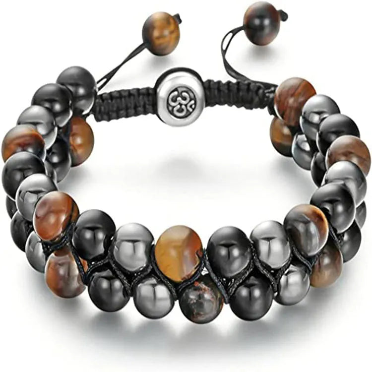Men's black and gold tiger eye stone woven bracelet with magnetic clasp showing geometric pattern