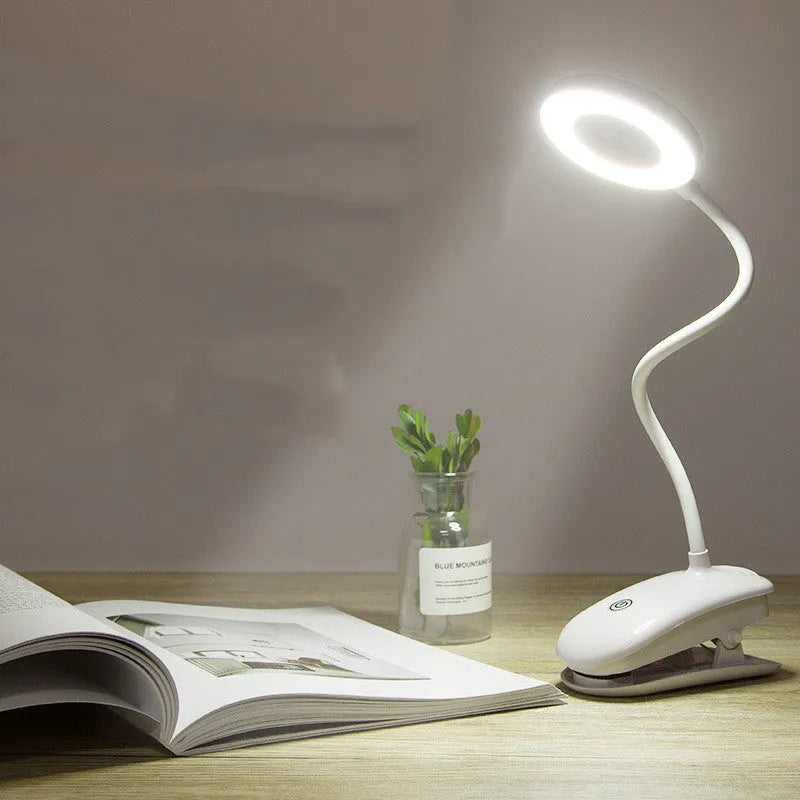 Clip-on rechargeable desk lamp with touch controls showing modern minimalist design