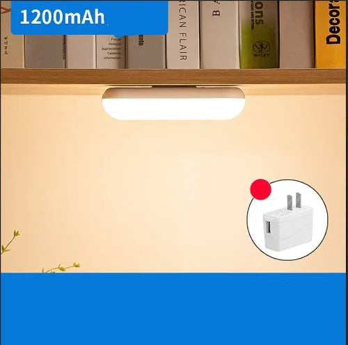 White rechargeable magnetic desk lamp with touch dimming on a wooden desk