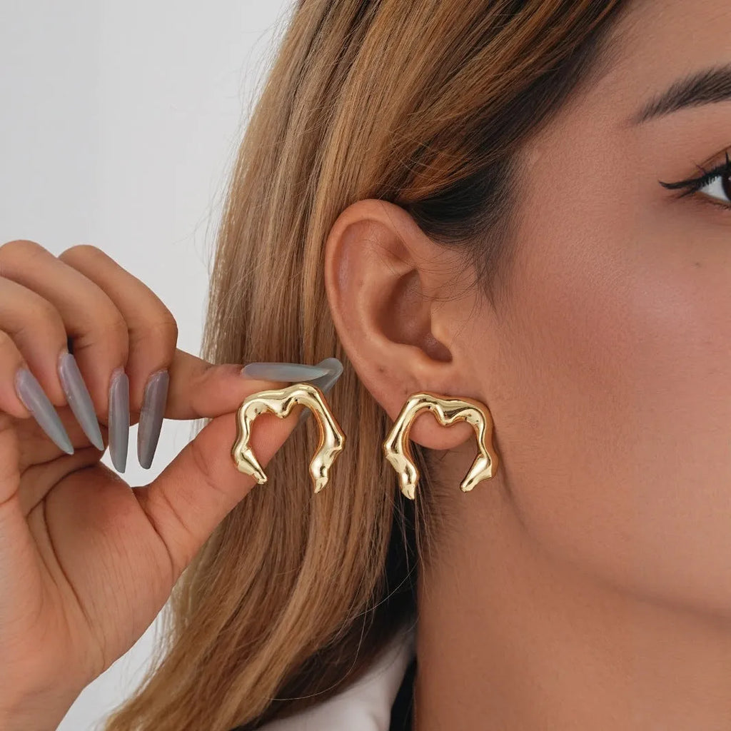 Ladies' geometric irregular gold plated brass earrings in retro light luxury style, four shape options