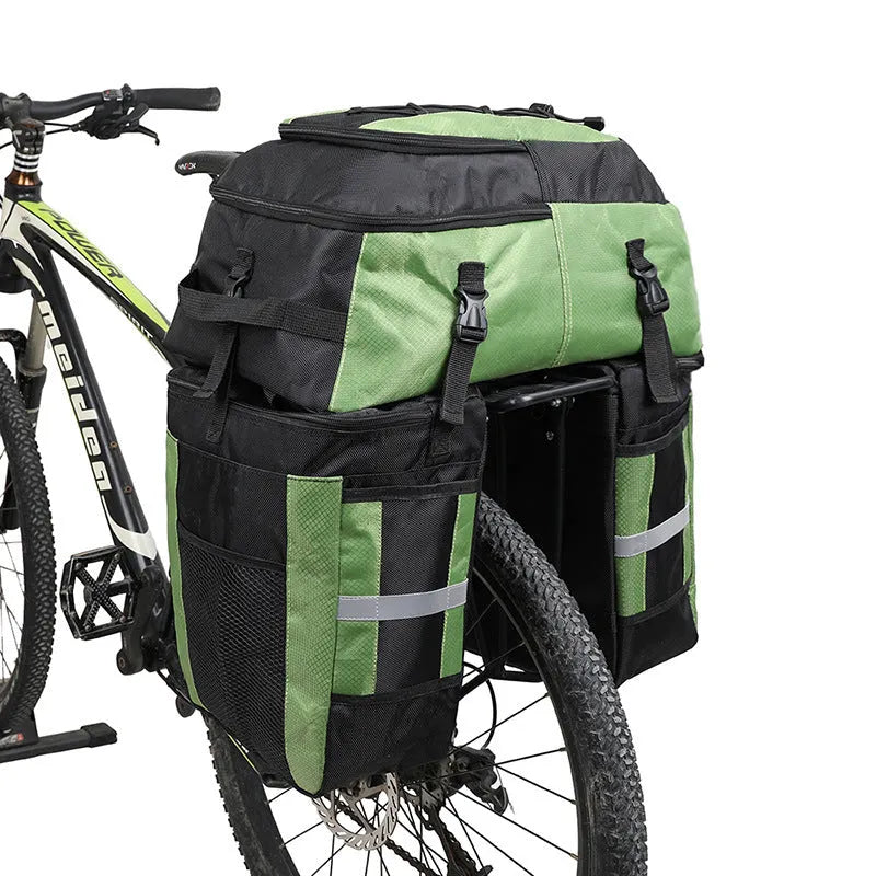 Rhinoceros 70-litre green bicycle rear storage bag mounted on a bike rack for touring.