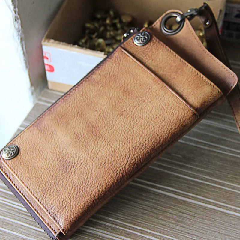 Retro long cowhide wallet with 13 card slots, zipper bill pocket, in bark brown, on flat surface