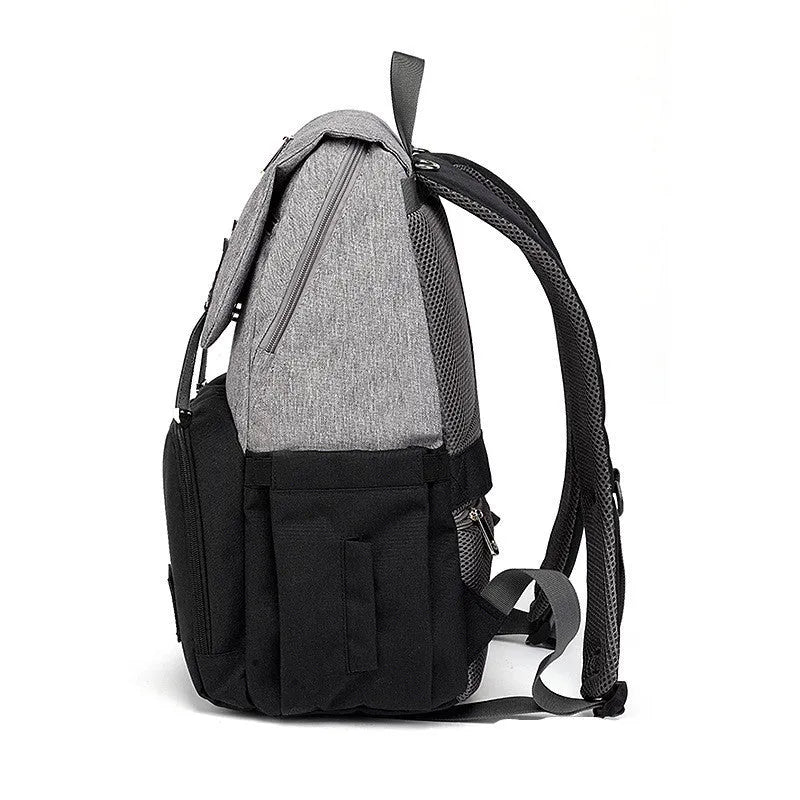 Grey white double shoulder mummy bag with bottle, stroller hooks, and multiple pockets for baby essentials