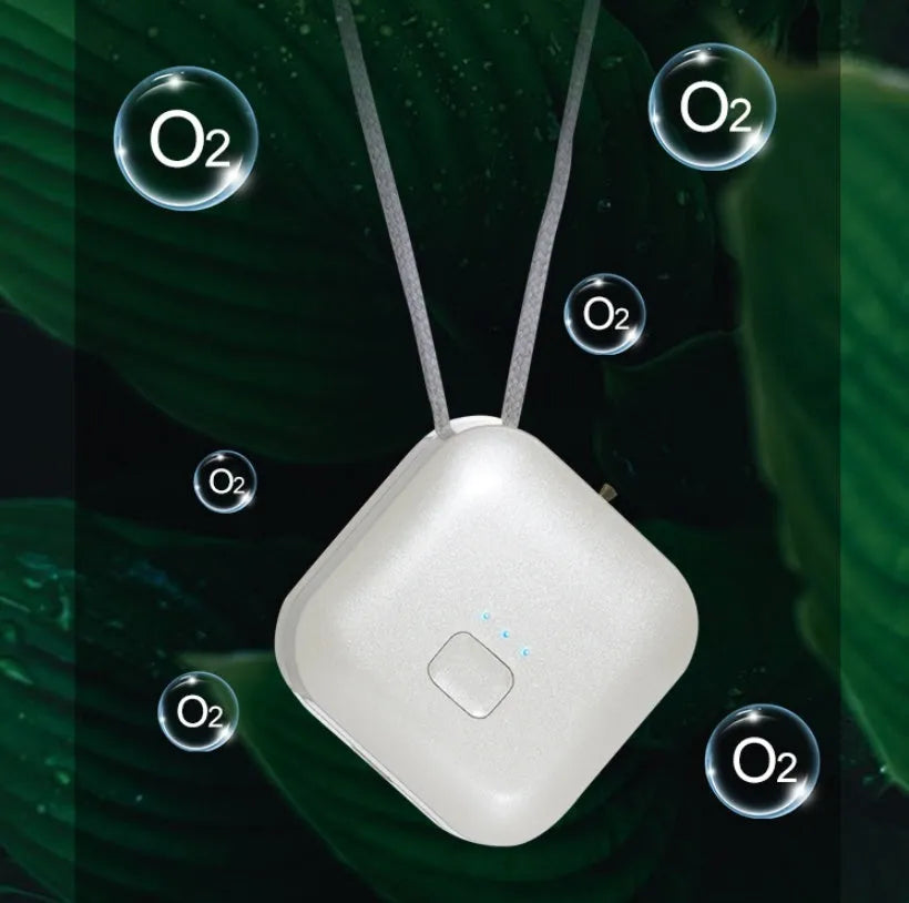 Mini USB portable air purifier necklace in blue, shown worn and with USB cable.