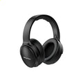 Awei black wireless Bluetooth over-ear headphones folded with audio cable and charging cable visible