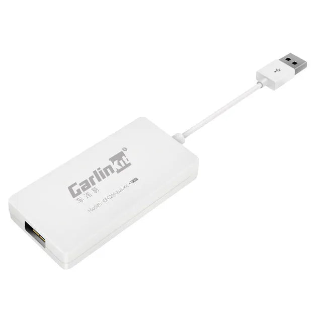 Black wireless CarPlay USB dongle for connecting iPhone to Android car stereo.