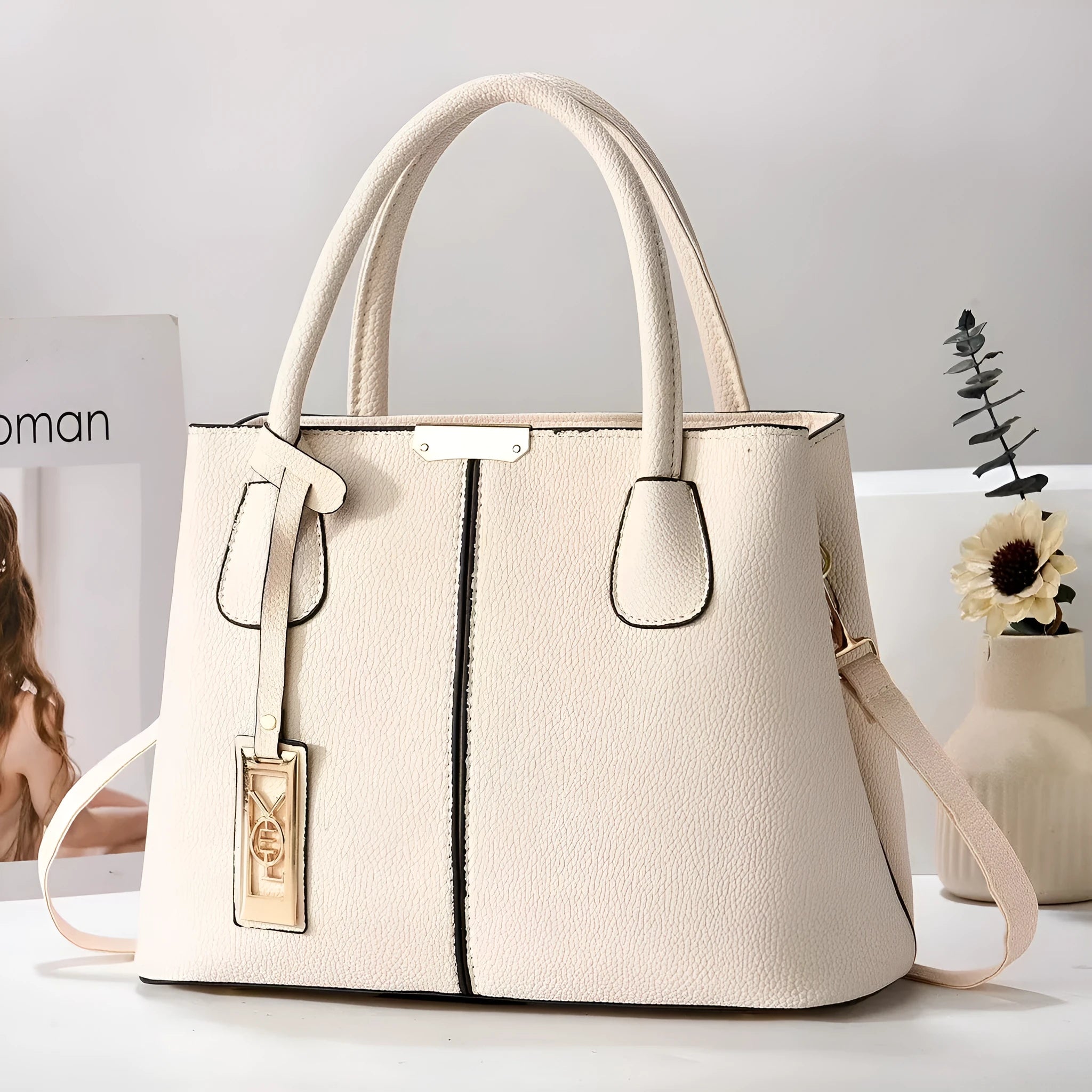 Soft PU leather large capacity shoulder bag for women in a horizontal square shape with an adjustable strap.