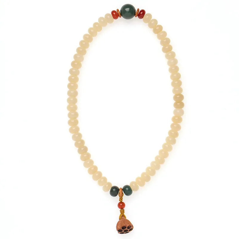 Cream topaz wooden bodhi bracelet with 6 by 9mm flat round beads for women