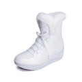 Black women's lace-up winter boots with a platform sole on a neutral background.