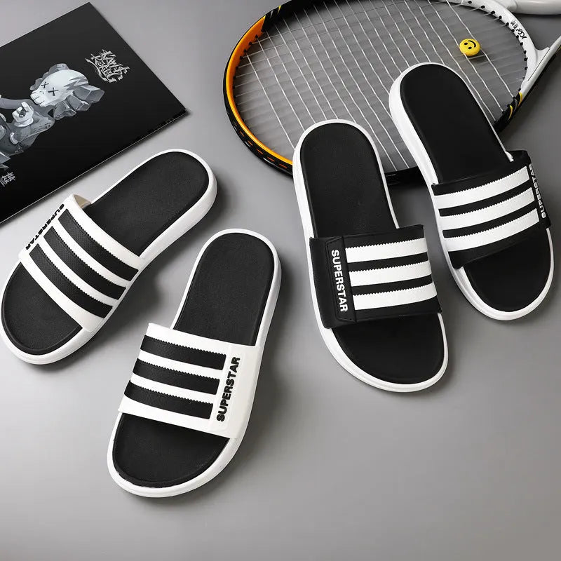 Non-slip bathroom slippers in black green and white with rubber outsole