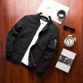 Men's slim-fit casual baseball jacket with zipper front and side pockets in solid colour.
