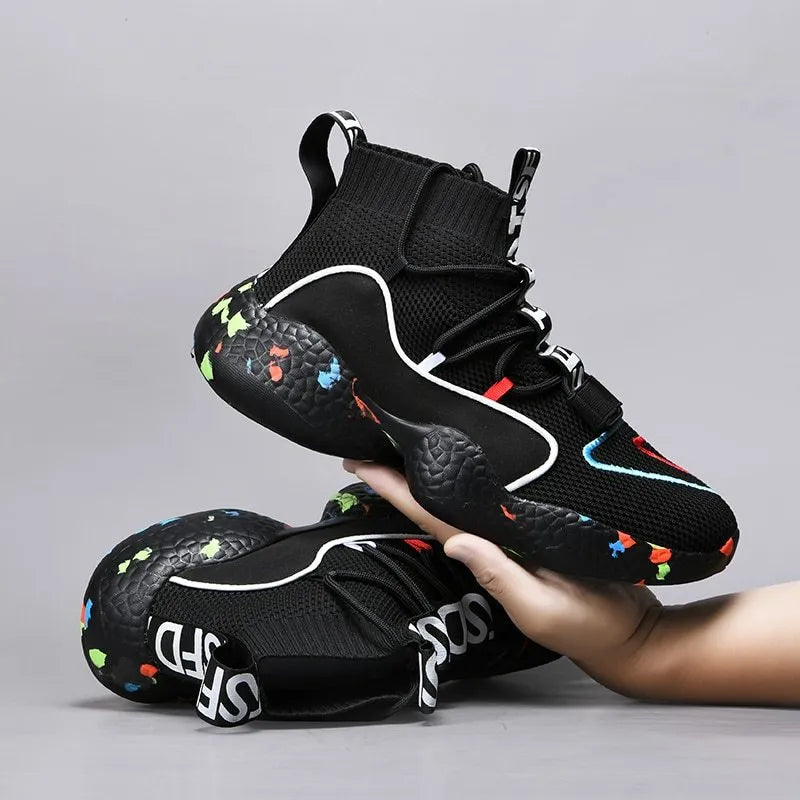 Men's camouflage sneakers with mesh upper and vulcanised rubber sole on a plain background.