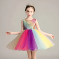 Girls cute rainbow skirt with lace and mesh layers, seven colours, 100% polyester outer, 80% cotton lining, available in sizes up to 160cm