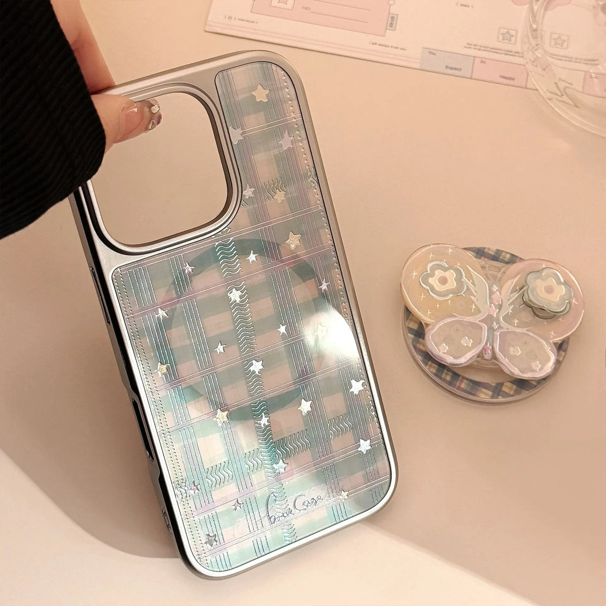 Gilding phone case with rotating bow magnetic bracket in silver edge magnetic green grid yellow and pink star.