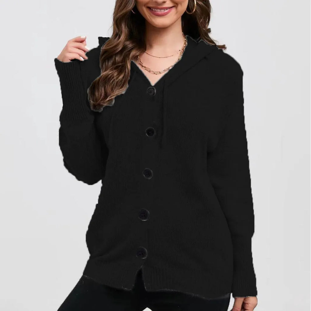 Women's loose fit thick cotton hooded cardigan sweater in a solid colour on a hanger.