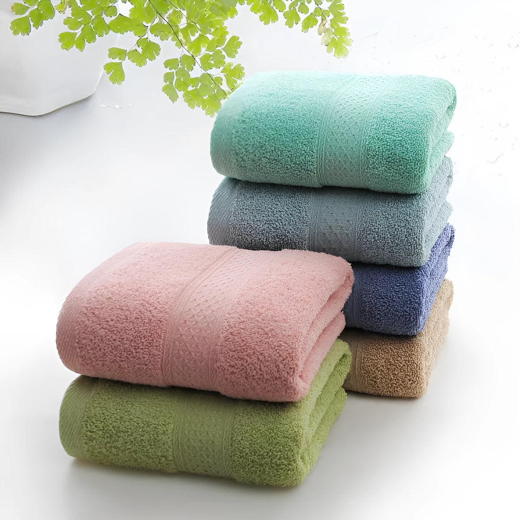 Thickened cotton blend bath and beach towel shown in one of its available colours like apple green or dark blue